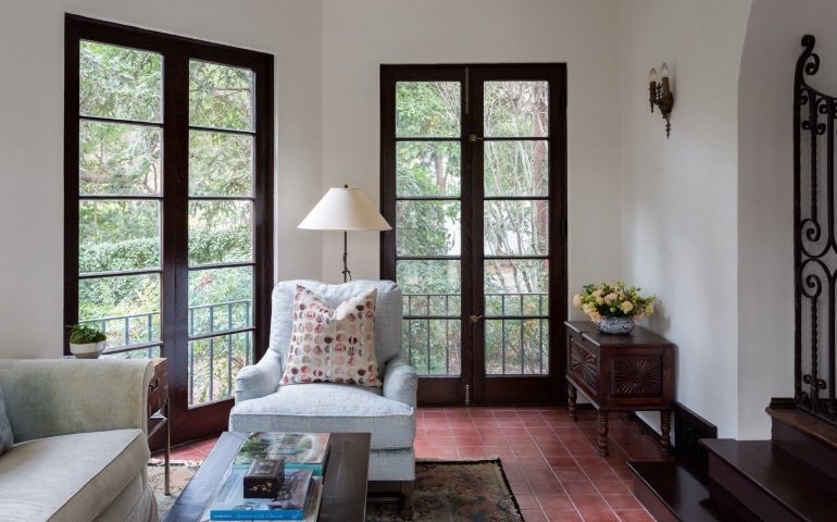 Oh So Spanish Transitional Sunroom Design